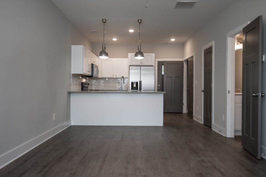 The Milledge 2-bedroom townhome floor plan at Puritan Mill in Athens, GA, featuring 2.5 baths and 1,046 sq. ft.